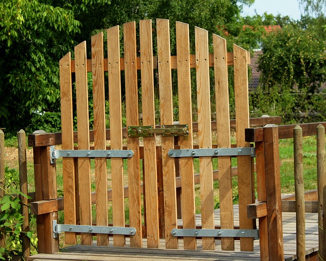 damaged wood fence